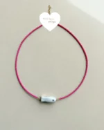 Pink fish necklace